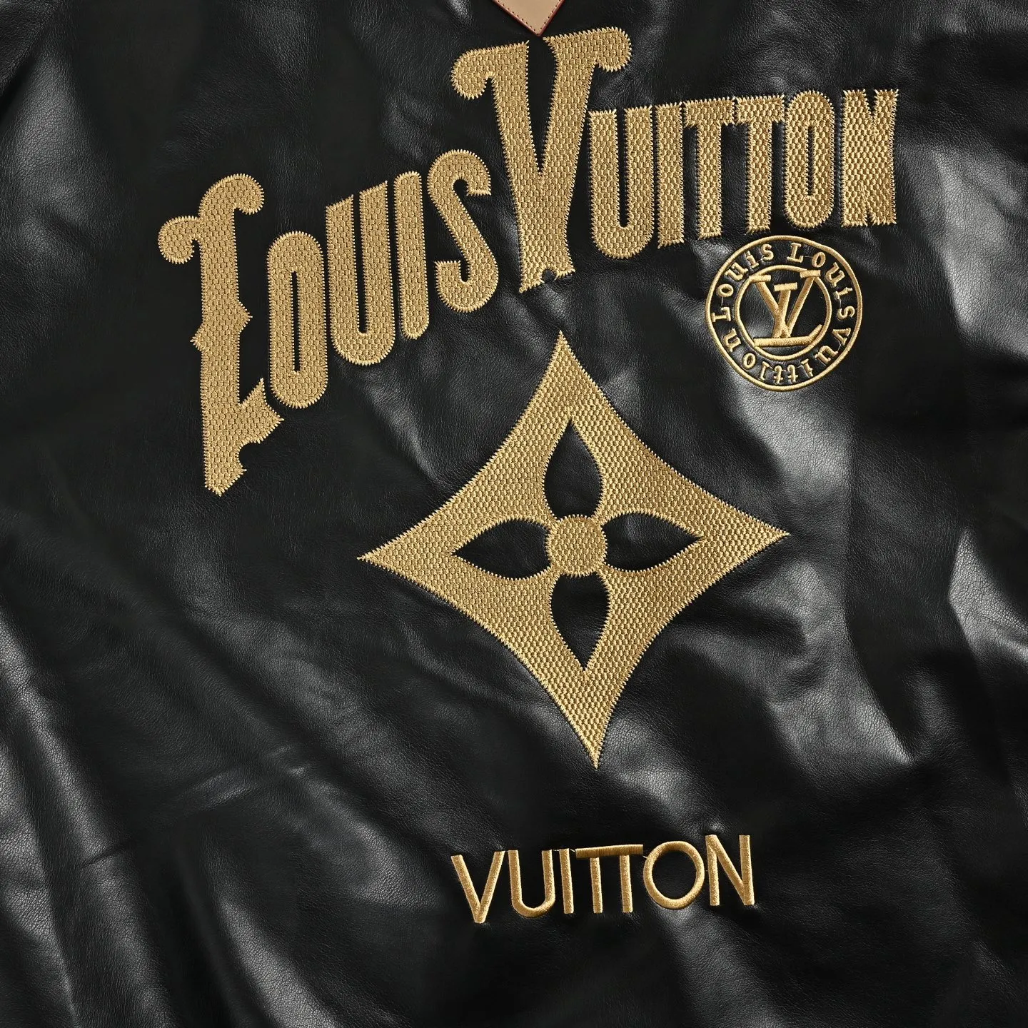 Louis Vuitton/Louis Vuitton black gold embroidered logo lapel leather jacket